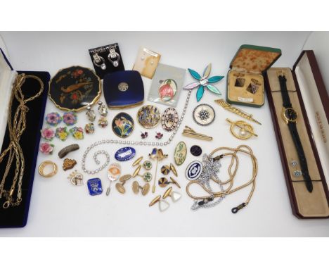 Two powder compacts, vintage shamrock cufflinks and a collection of vintage costume jewellery Condition Report:No condition r