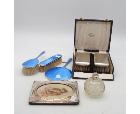 A collection of silver including a three piece blue guilloche enamel dressing set, by Barker Brothers Ltd, Birmingham, a pair