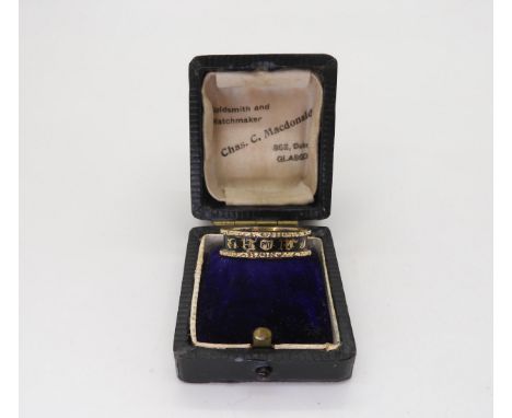A yellow metal mourning ring, with black enamel, engraved Robert Laing died 1st July 1842, finger size Q, weight 2.5gms Condi