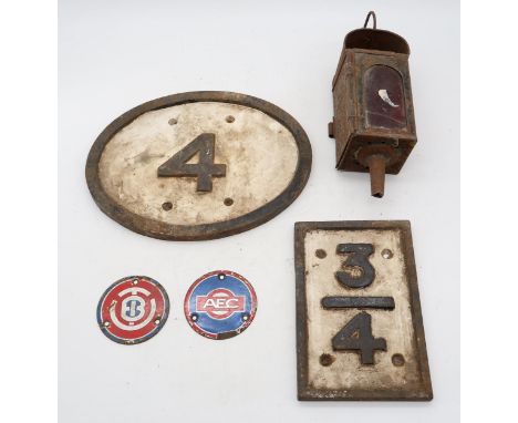 RAILWAY INTEREST Two painted cast iron mile markers, the larger measuring approx. 33.5cm x 26cm; together with a signal lante