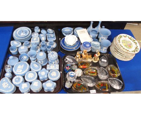A large quantity of Wedgwood blue jasperware including trinket boxes, plates, dishes, vases etc together with Hummel figures 