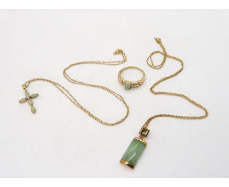 A 9ct gold green hardstone cross set with a diamond accent, on a 50cm rope chain, a further 9ct green hardstone pendant, set 