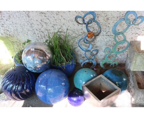 A large mixed lot of assorted blue ceramic planters, garden sculptures etc Condition Report:Available upon request