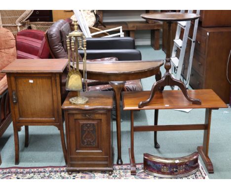 A mixed lot to include mahogany single door bedside, demi lune table, oak coal scuttle, brass fire tools, mahogany occasional