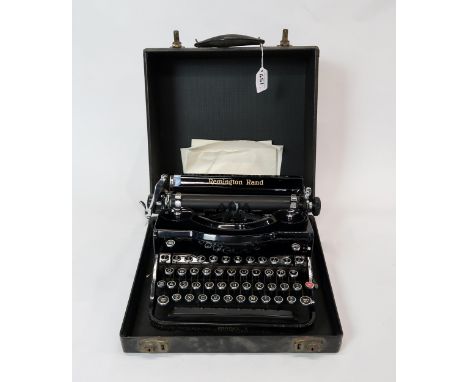 A Remington Rand Model 1 portable typewriter, vintage Electro-lux vacuum cleaner in pine case and boxed deadstock Hoover spar