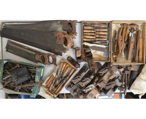 A large mixed lot of assorted carpentry tools to include chisels, wood planes, moulding planes etc Condition Report:Available