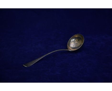 An Edward VIII silver ladle. The reverse of the handle with crest depicting a hand pointing towards a star and a feathered cr
