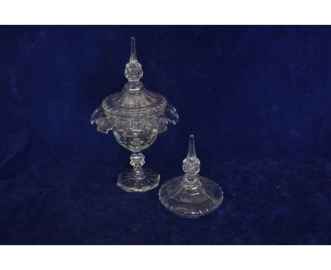 A 19th century glass vase and cover with hexagonal tapering finial, down-swept lid, slice cut body, knopped hexagonal stem an