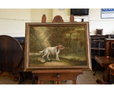 An oil on canvas portrait of a spaniel in a wooded landscape holding a cock pheasant in his mouth. Unsigned. 24 by 17¼ins. In