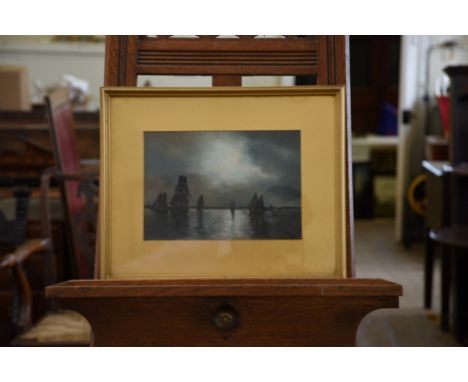 A 19th century oil on board, moonlit seascape with sailing vessels to the foreground. Unsigned. 9½ by 6¾ins. In a gilt frame.