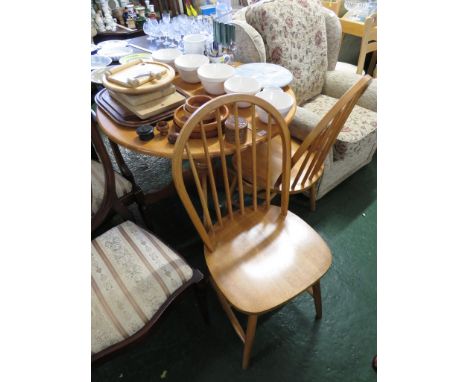 LIGHT WOOD DROP LEAF CIRCULAR KITCHEN TABLE TOGETHER WITH TWO KITCHEN CHAIRS.