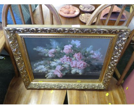 PRINT ON BOARD OF FLOWERS IN A GILT EFFECT FRAME.