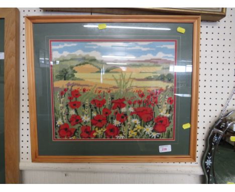 FRAMED AND GLAZED TAPESTRY NEEDLE WORK OF POPPY FIELDS.
