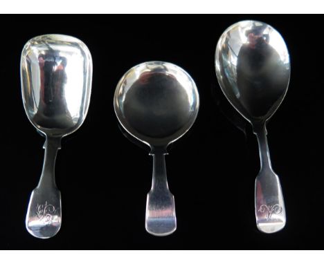A George IV silver Fiddle pattern caddy spoon, maker Francis Powell, London, 1824, another by Charles Shipway, London, 1828 a