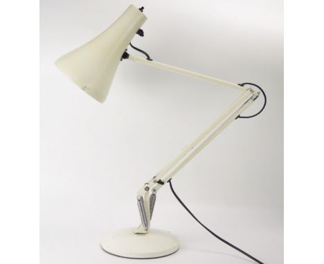Herbert Terry, a 1970's model 90 angle-poise table lamp, in pale cream on a weighted circular base. 