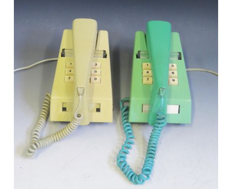 A British Telecom model 1/766 push-button trim phone in yellow ochre, with plug in lead, circa 1976/78, together with a Model
