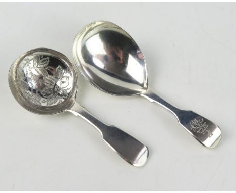 A Victorian silver caddy spoon, maker Chawner &amp; Co, London, 1843 crested and initialled, and another by Samuel Hayne &amp