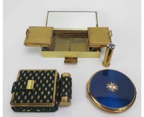 Martini, a ladies travelling compact box, with two hinged powder compacts and lipstick holder, 11.5cm wide a circular compact
