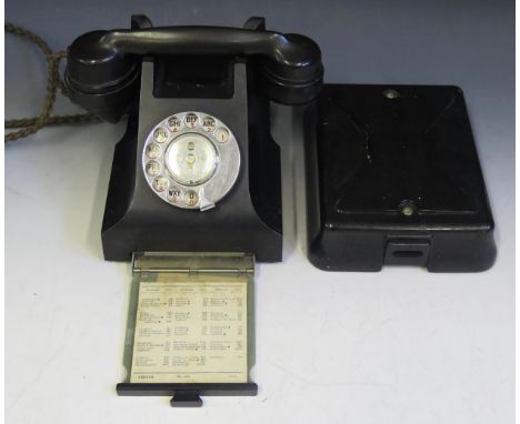 A GPO Model 332L telephone handset, in black Bakelite with sliding drawer to the base, circa 1950's with black Bakelite case 