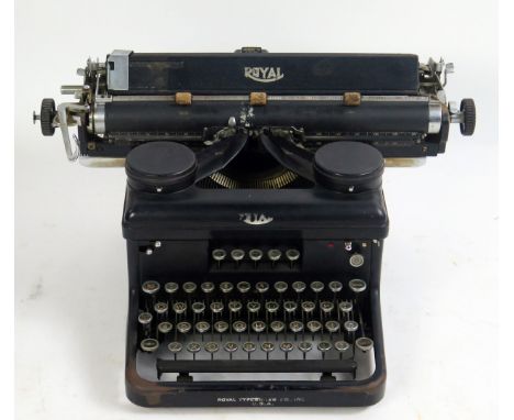A Royal manual office typewriter, with black casing and 36cm roller. 