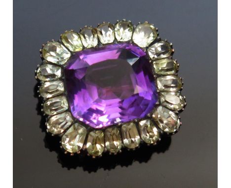 An Antique Amethyst and Chrysolite Brooch, 14.2x12.9mm principal stone, converted from a three strand necklace clasp, 9.64g 