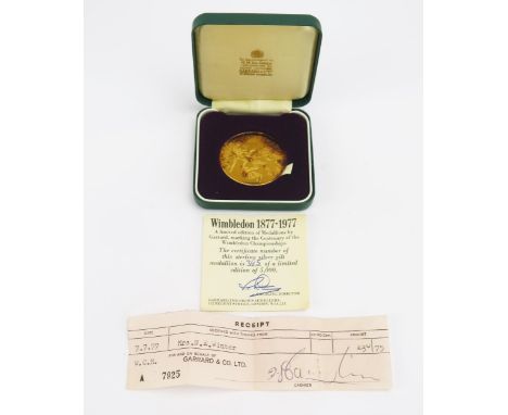 A Wimbledon 1877-1977 Silver Gilt Medallion by Garrard. Boxed with COA 