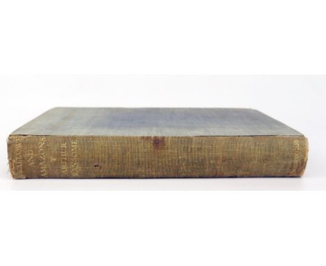 RANSOME, (Arthur). 'Swallows and Amazons' first edition, cloth, gilt, spine split in places, boards are bleached out in place