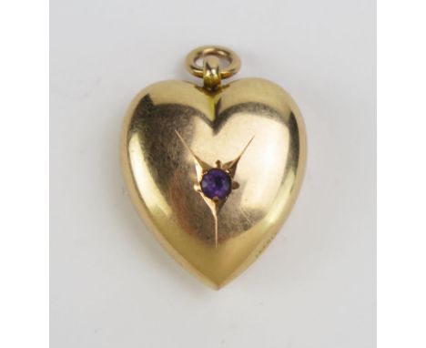 An Antique 15ct Gold and Amethyst Heart Shaped Pendant, 26.3mm drop inclusive of suspension ring, Birmingham 1913, John Grins