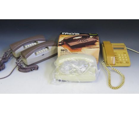 A British Telecom Inphone, in stone colour with instruction manual and box, together with a Sceptre 100 telephone hand set an