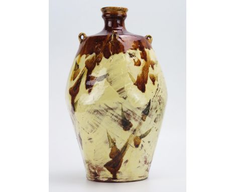 A large terracotta vase of Japanese influence, with brushed abstract decoration to the ovoid body, 33cm high. 