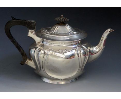 An Edward VII silver teapot, maker Joseph Gloster Ltd, Birmingham, 1905, of oval Art Nouveau influence, raised on an oval foo