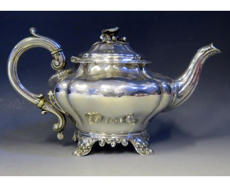 A William IV silver teapot, maker Joseph Angell I &amp; John Angell I, London, 1833, crested, of squat melon form, the domed 