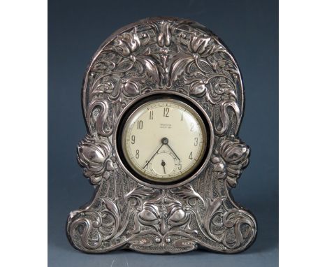 An Edward VII silver pocket watch holder, maker Williams (Birmingham) Ltd, Birmingham, 1903, of Art Nouveau influence with fl