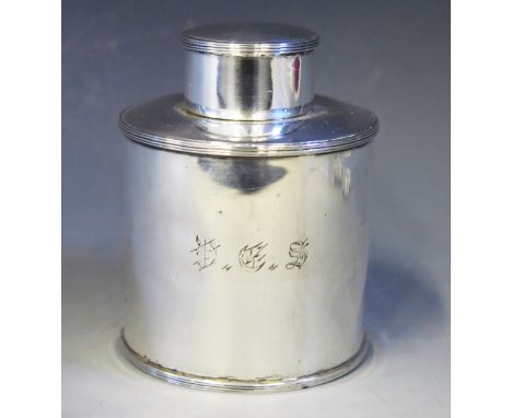 An Edward VII silver tea caddy and cover, maker Atkin Bros, Sheffield, 1908, initialled, of cylindrical outline with reeded b