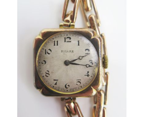 A ROLEX Ladies 9ct Gold Wristwatch, 25.5mm case, back no. 3898, Rolex 15 jewel manual wind movement, Glasgow 1923 and on a Br