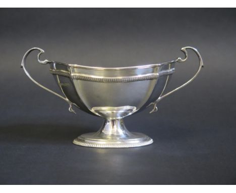 A George V silver twin handled sugar basin, maker Roberts &amp; Belk, 1918, of oval outline, raised on an oval beaded foot, 1