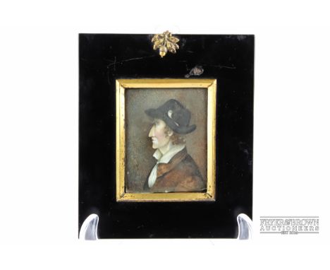 A miniature painting on ivory of a man in a black hat with pipe in the band, paper label verso 'Portrait of a stone quarrier 