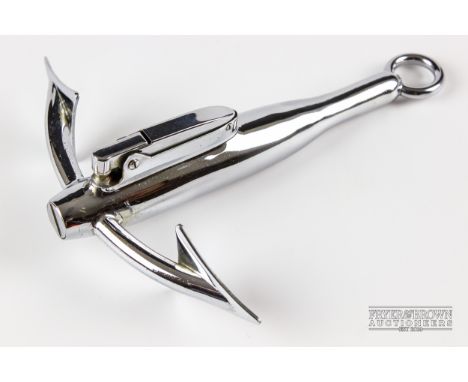 An Art Deco novelty chrome lighter in the form of an anchor