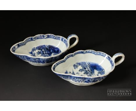 A pair of antique Chinese Qianlong period blue & white sauce boats, c1780, of scalloped leaf shape decorated with typical Chi