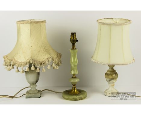 A variegated green onyx lamp base; and two others, probably alabaster (3)