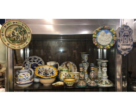 SHELF OF QUIMPER, FAIENCE, AND MAJOLICA POTTERIES 