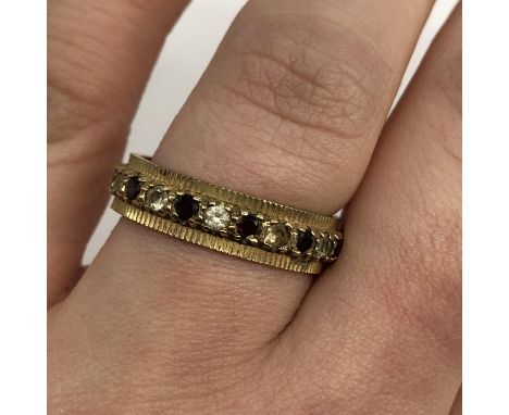 9CT GOLD RUBY AND CZ ETERNITY BAND SIZE Q 3.8G APPROX.