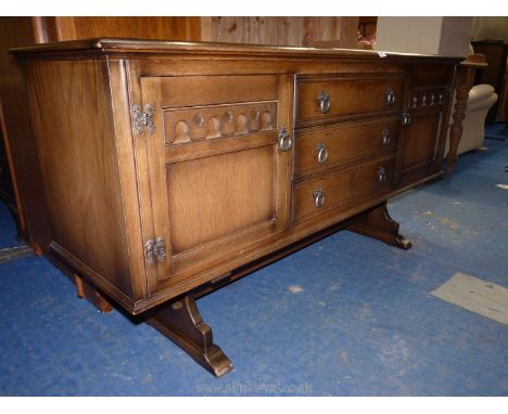 A Country style Dale wood vintage sideboard having two cupboards and three drawers 5' 2" x 18" X 32" high.