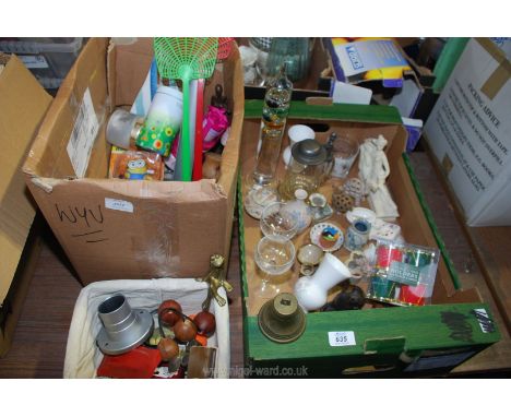 A box of ornaments, a Galileo thermometer, etc.