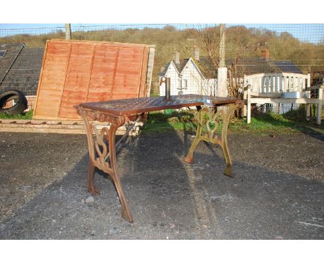 Pierced top, heavy metal patio table.