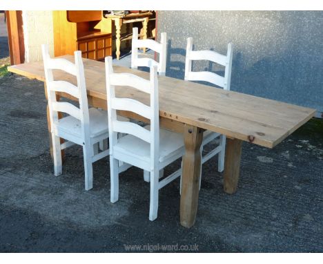 A three planked kitchen table. 95" x 26" x 30 1/2" with matching Four white painted ladder back dining chairs.