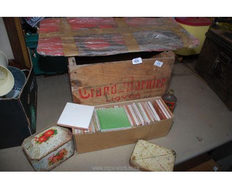 A pine box, small tiles and a tractor head gasket.