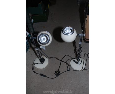 A pair of M&amp;S eyeball style table lamps.