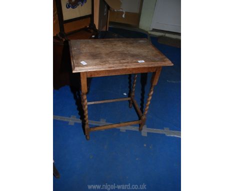 An oak side table on barely twist legs, 16" x 24" x 28".