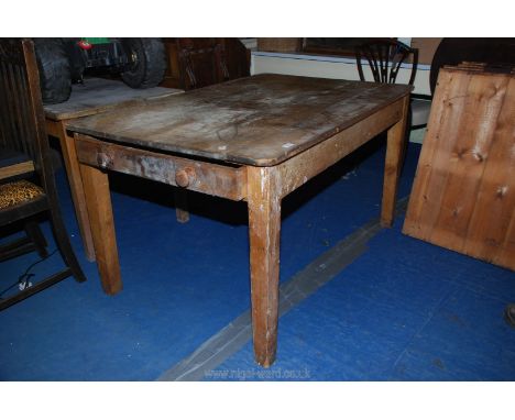 A pine kitchen table  with single drawer to end, 54" x 35" x 30".